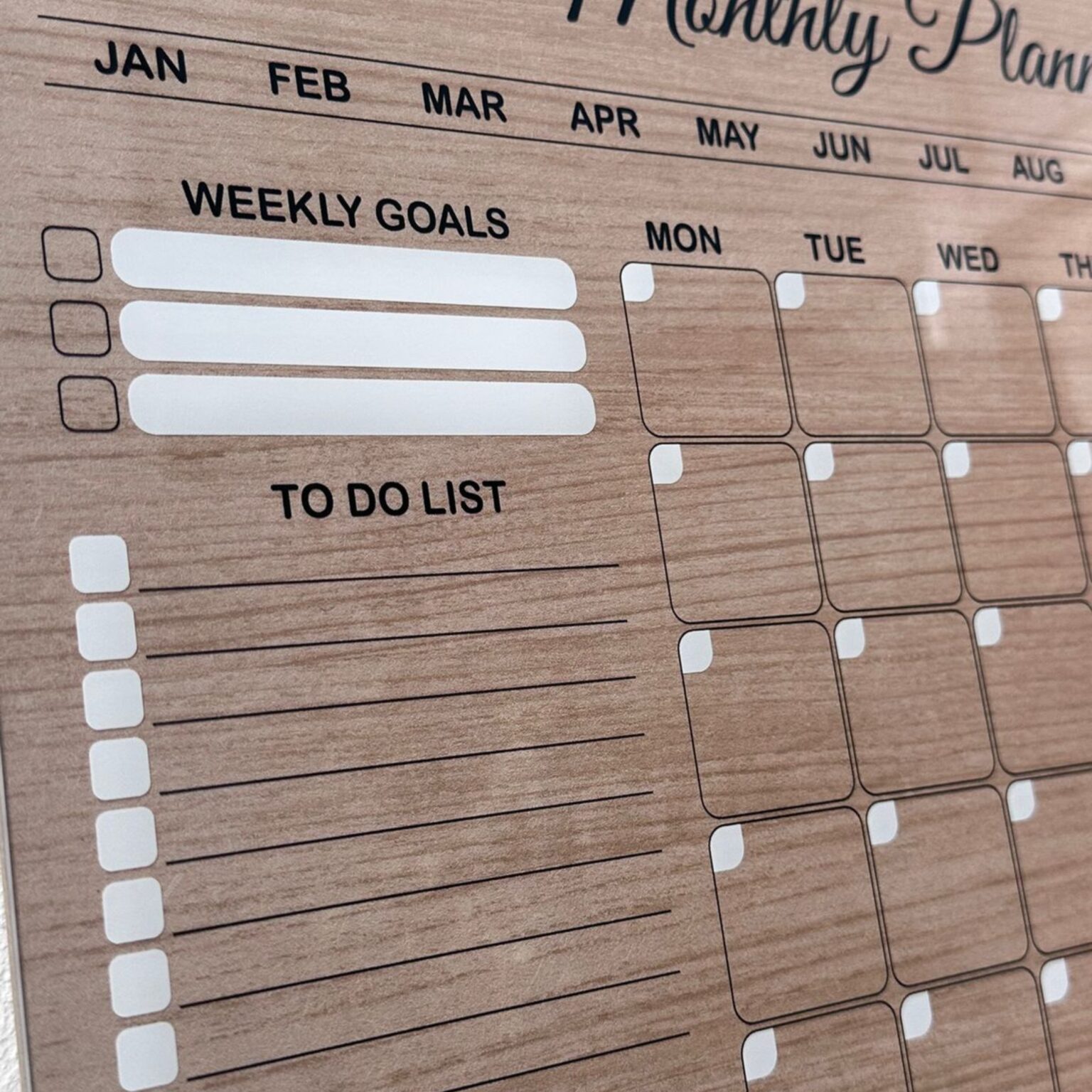 Wood-effect monthly planner with weekly goals and to-do list