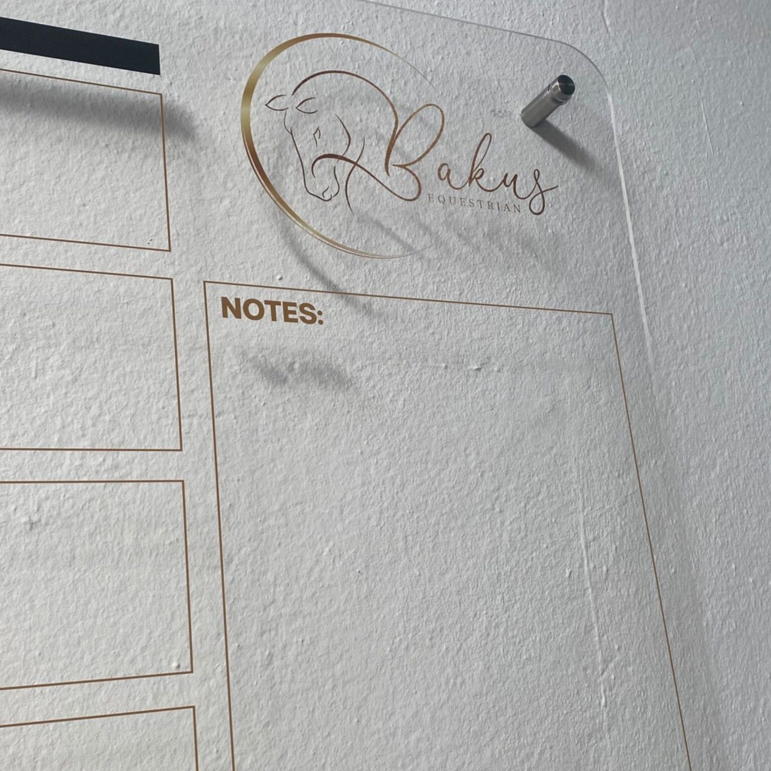 Branded equestrian planner with silver stand-off pin