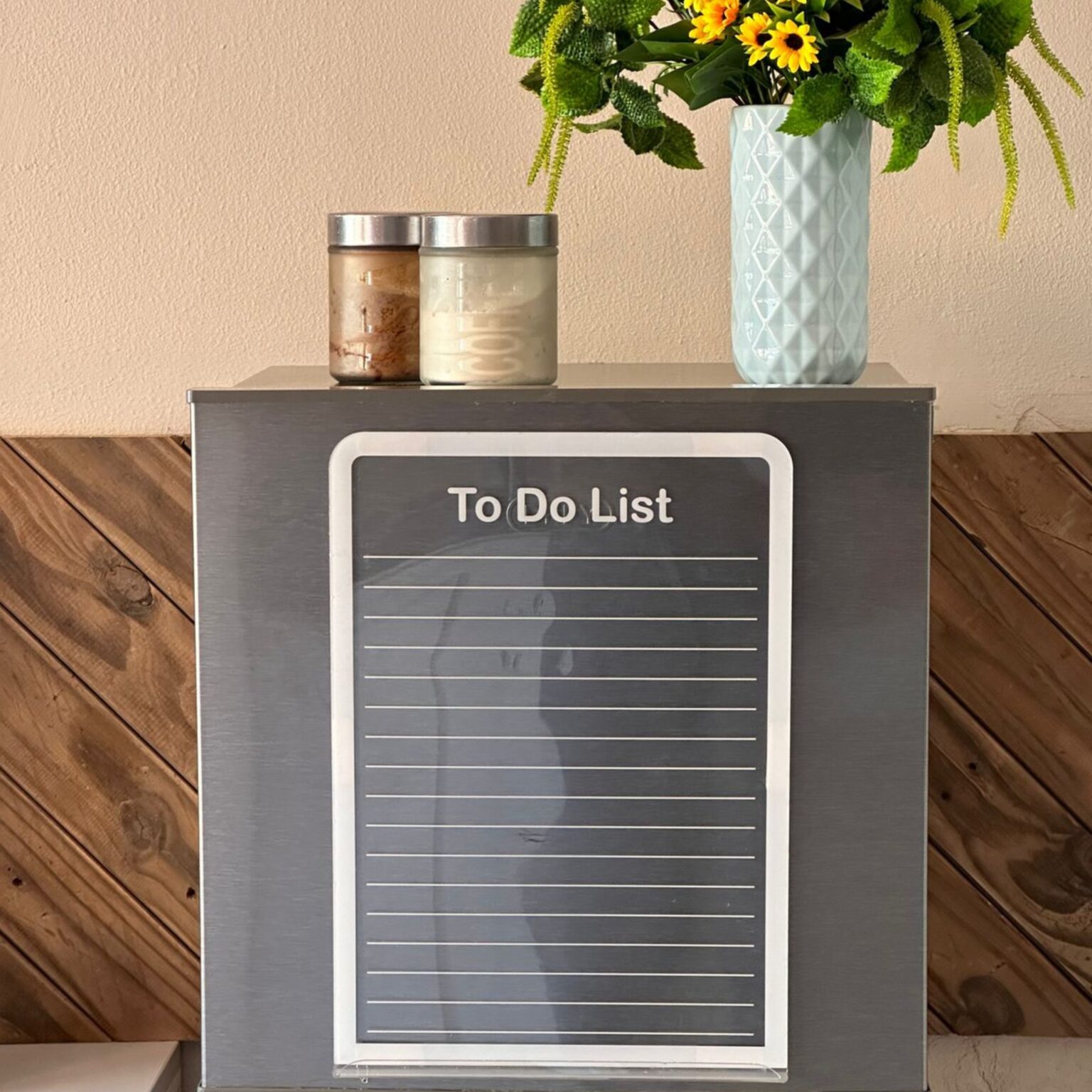 Frosted to-do list board on a fridge